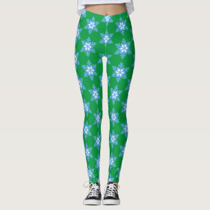 Heldere blauwe sneeuwvlokken op heldere groene Leg Leggings