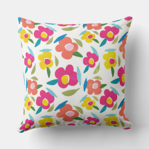 Heldere bloemen op wit kussen