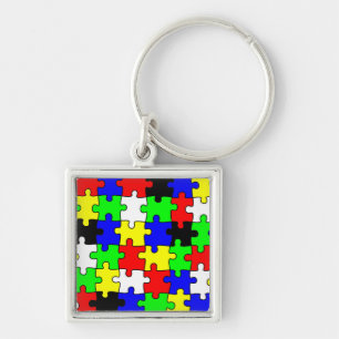 Heldere en kleurrijke puzzelstukken sleutelhanger