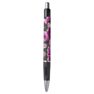 Heldere lila en roze tulpen op een zonnige dag pen