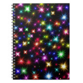 Heldere regenboogsparken, sterren en vuurwerk notitieboek (Voorkant)