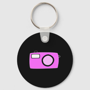 Heldere roze camera. Op zwart. Sleutelhanger