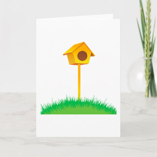 Heldergeel vogelhuis op gras kaart