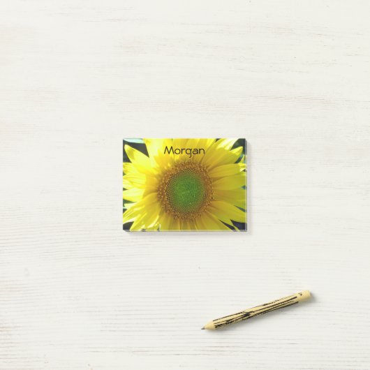 Heldergele zonnebloem post-it® notes (Op bureau)