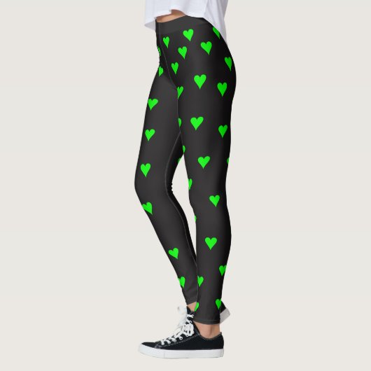Heldergroene hartvormen op zwarte achtergrond leggings (Links)