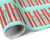 Helderrode ski's op blauw achtergrond inpakpapier (Rol Hoek)