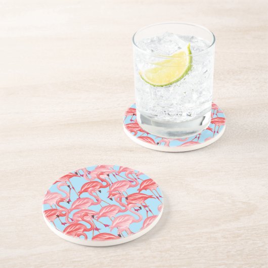 Helderroze lamingos op blauw zandsteen onderzetter (Zijkant)