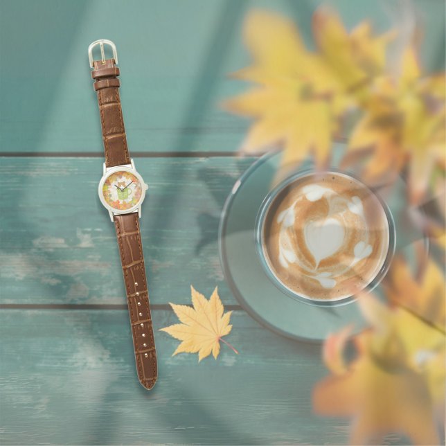 Herfst Break Kattenhorloge Horloge (A Fall Break Cat Watch is on the table outside. )