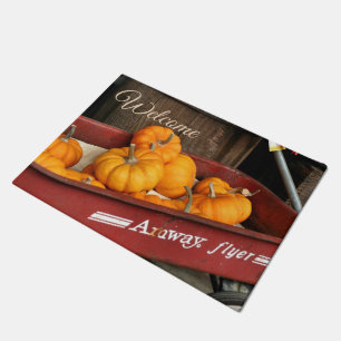 Herfst pompoenen in oude rode wagen welkom deurmat