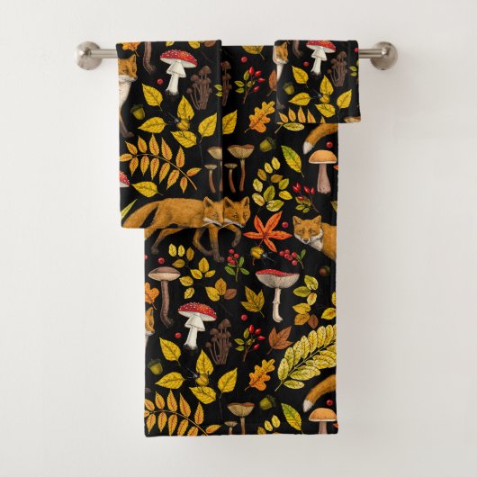 Herfst vossen op zwart bad handdoek (Insitu)