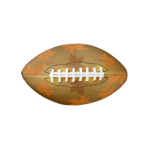 Herfstpatroon met vallende esdoornbladeren en boke american football