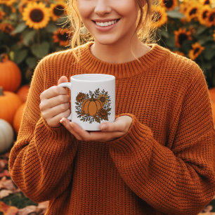 Herfstpompoen met zonnebloem en herfst koffiemok