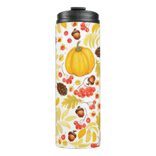 Herfstpompoenen, eikels, achtergrond. thermosbeker