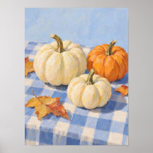 Herfstpompoenen op blauwe geruite tafelkleed