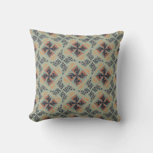 Herhalend geometrisch patroon met blauw en perzik kussen