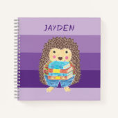 Hérisson avec un cahier violet pour enfant avec de (Devant)