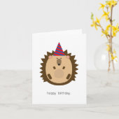 Hérisson dans une carte de casquette d'anniversair (Fleur jaune)