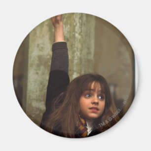 Hermione steekt haar hand op magneet
