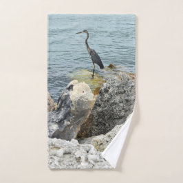 Heron On Rocks At Beach Handdoek