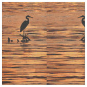 Hérons au tissu du coucher du soleil (Fermer)