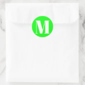 Het aantal neongroen van het monogram initiaal aan ronde sticker (Tas)