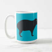 Het Capybara kijkt naar Mok (Links)