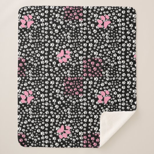 Het drukpatroon van poten NS 01b. Zwart BG Sherpa Deken (Voorkant)