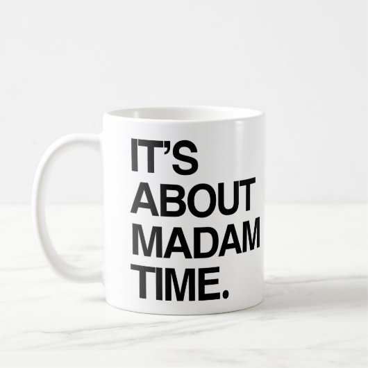 Het gaat over Madam Time Koffiemok (Links)