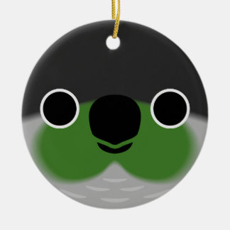 Het gezicht van een groene wang parkiet keramisch ornament