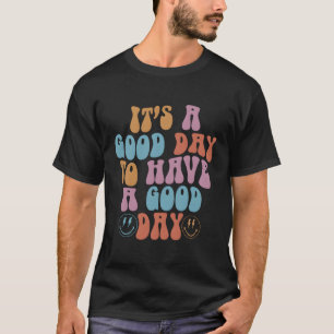 Het is een dag om een kleurrijk lachgezicht te heb t-shirt