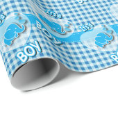 Het is een jongen, blauw en wit geplakt met Baby o Cadeaupapier (Rol Hoek)
