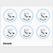 Het is een jongensblauw schommelpaard ronde sticker (Vel)