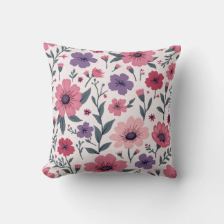 Het is een kussen gemengd met roze bloemen en paar