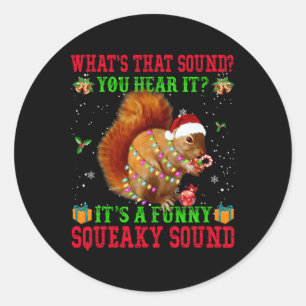 Het is een leuk piepend kerst-eekhoorntje  ronde sticker