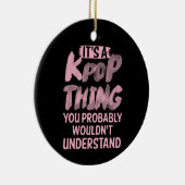 Het is een pop ding dat je niet zou begrijpen keramisch ornament (Rechts)