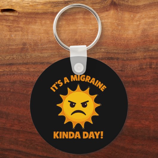 Het is een soort migrainedag sleutelhanger (Voorkant)