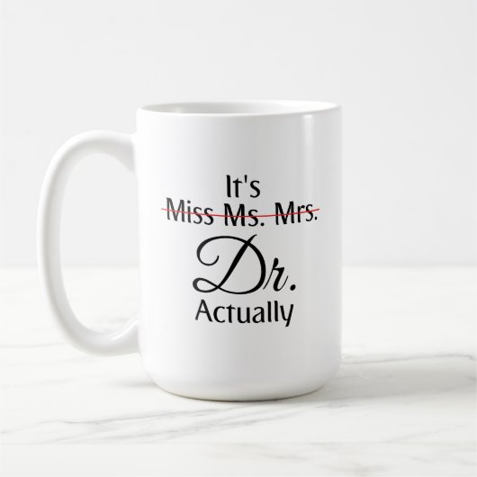 Het is Miss Mrs Dr. Eigenlijk Phd Afstuderen. Koffiemok (Links)