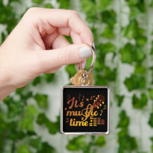 Het is muziektijd, gouden gitaar musical sleutelhanger