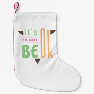 Het is oké om niet in orde te zijn. kleine kerstsok