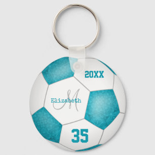 het kleine turquoise - blauwe en witte voetbalseiz sleutelhanger