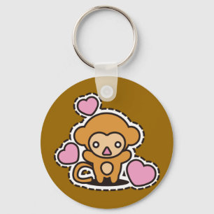 Het knuffelspelgoed van de aap sleutelhanger