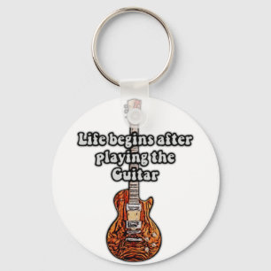 Het leven begint na het spelen van de gitaar. De r Sleutelhanger