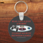 Het leven is een hobby tussen games sleutelhanger (Voorkant)