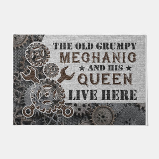 Het oude bruinemiddel en zijn koningin deurmat