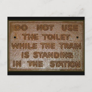 het oude teken van het treintoilet briefkaart