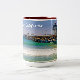 Het strand van Zuid-Californië en pier in San Clem Tweekleurige Koffiemok