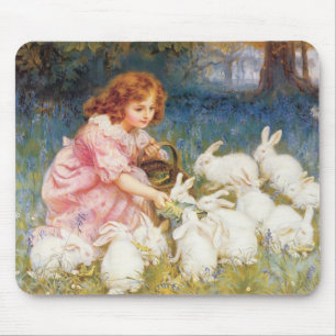 Het voeden van konijnen muismat