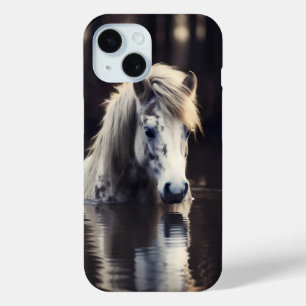 Het witte paard in het meer