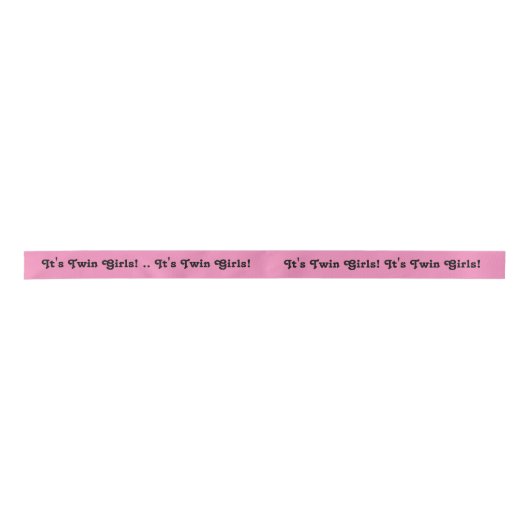 Het zijn tweelingmeisjes, lint in roze en zwart. (Voorkant)