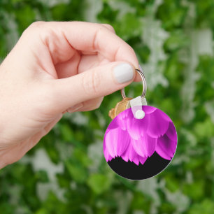 Hete roze bloemblaadjes op zwart sleutelhanger
